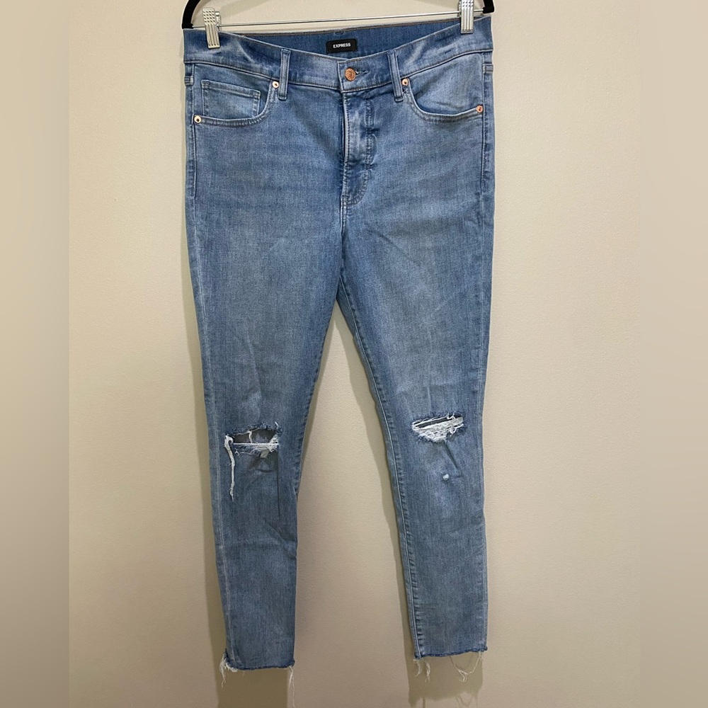 EXPRESS - Mid Rise Light Blue Distressed Skinny Jeans raw hem